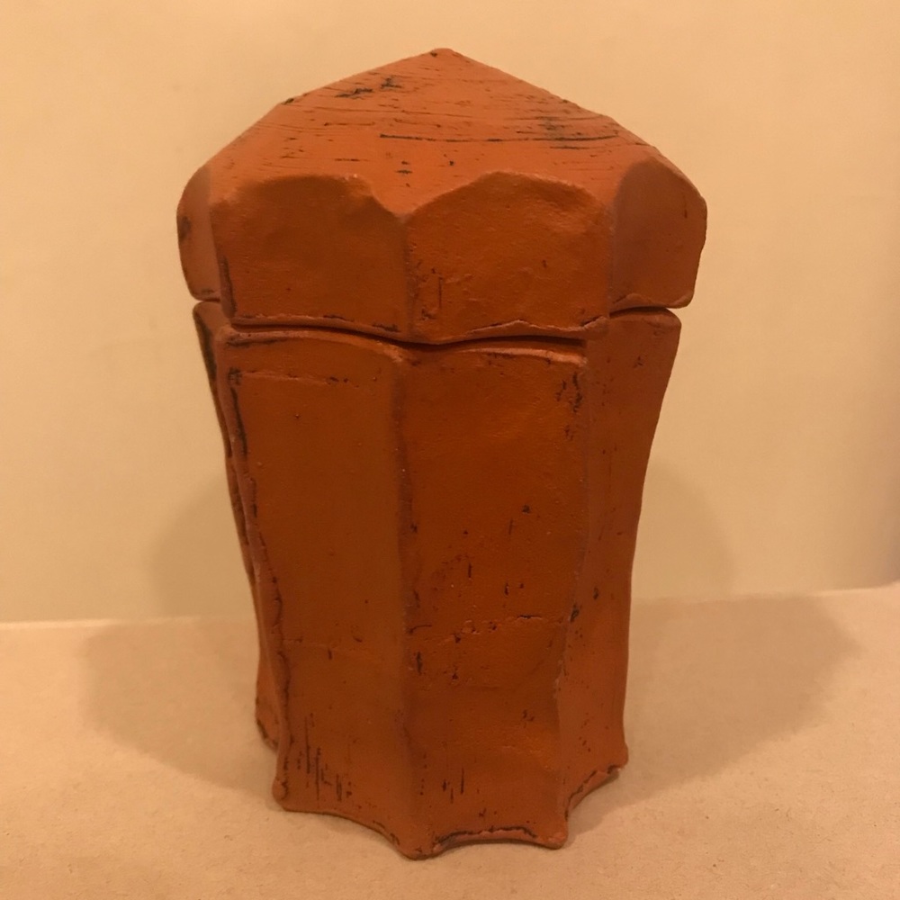 Custom lidded pottery jar by Neil Hora. Burnt Orange w black accents.